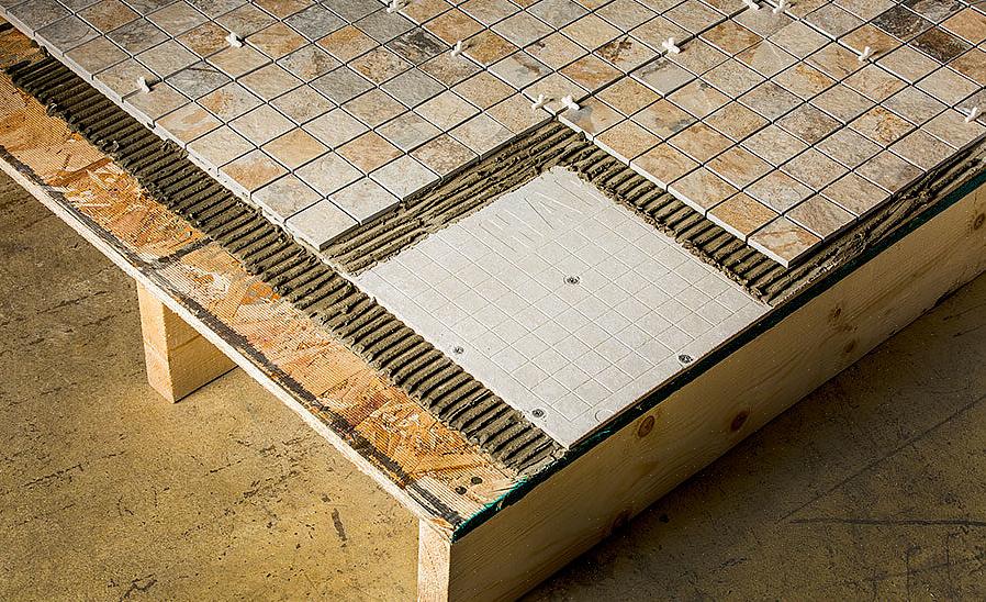 Teknisk set kan cementplader lægges over en betonplade som base for en flisinstallation